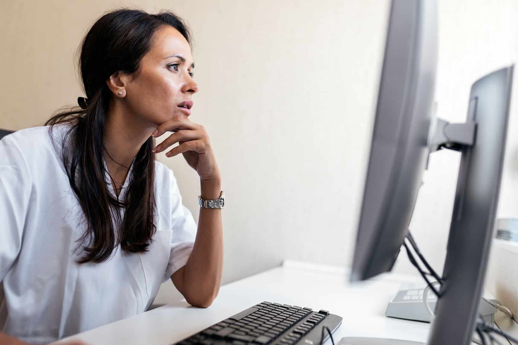 Doctor Using Computer At The Hospital