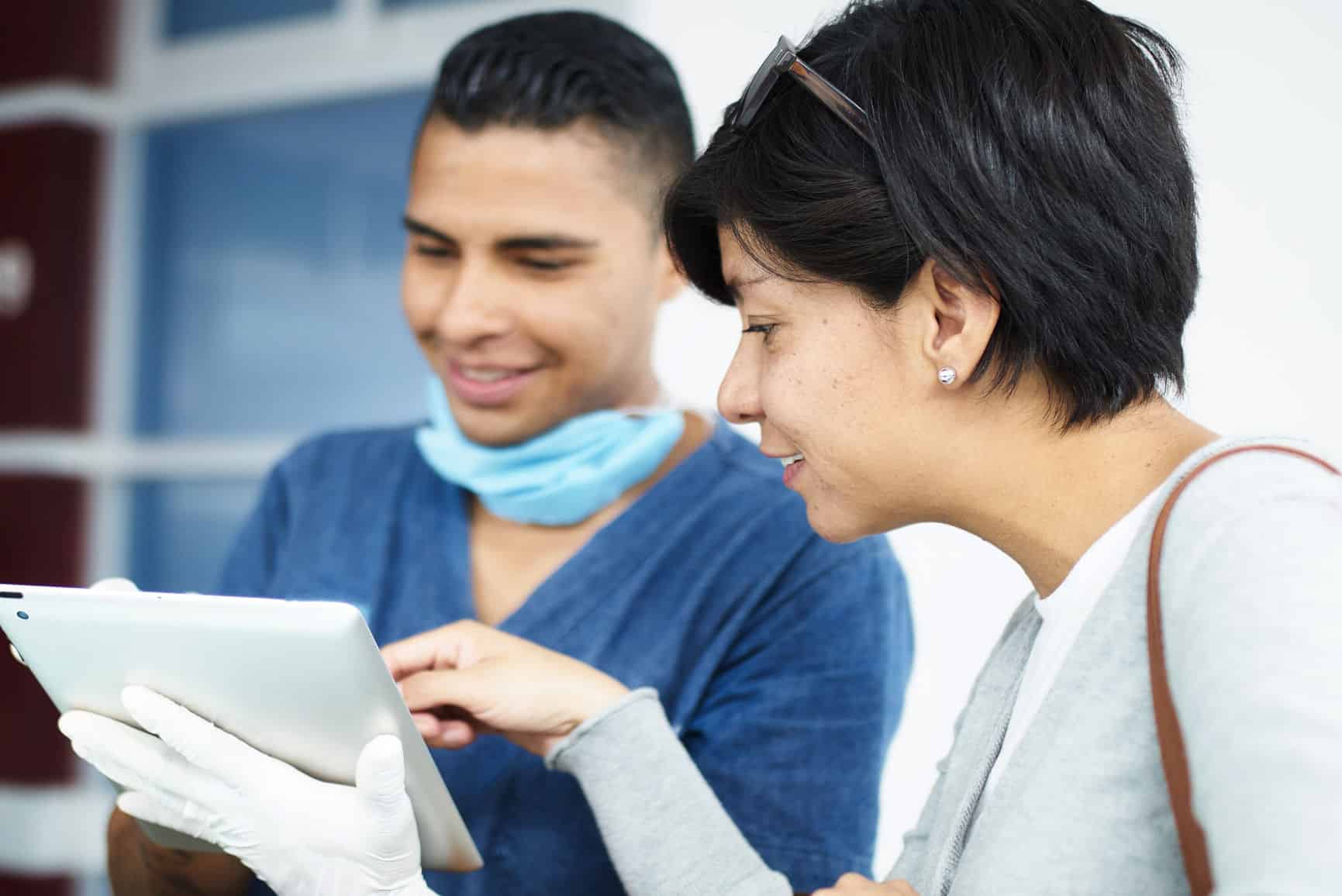 Patient And Medical Staff Using A Tablet